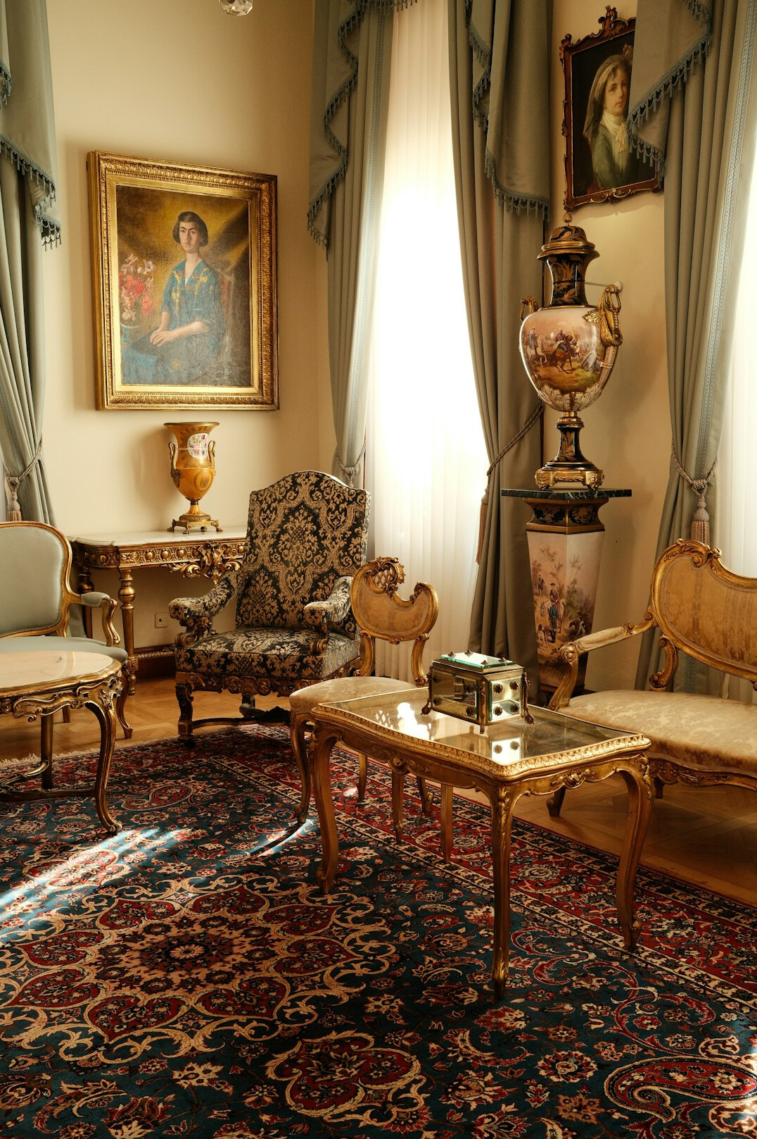 Elegant vintage living room with velvet armchairs and brass lamps